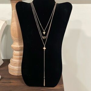 Gold tone triple strand rhinestone stone accent lariat necklace